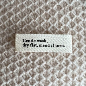 Label, Gentle wash, dry flat, mend if torn